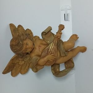 And authentic reproduction of an original Fontanini sculpture hand-painted